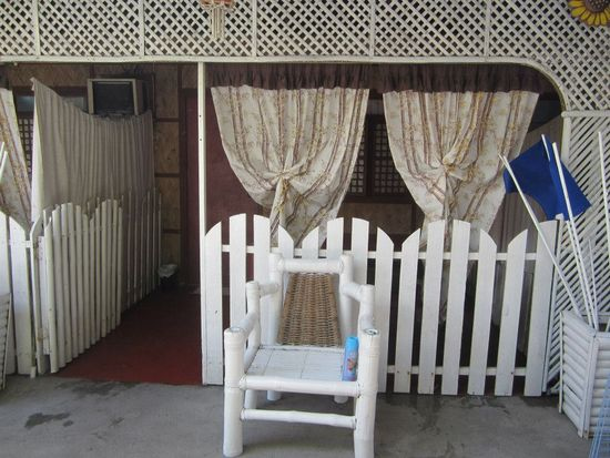 Outside the room, fronting the picnic tables and the pool, La Primavera Beach Resort, Matabungkay Batangas.